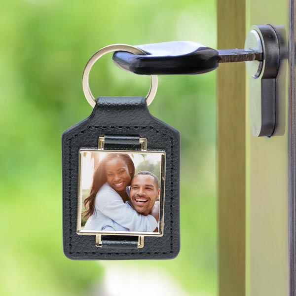 Keep your keys together with a photo key chain featuring a picture of a loved one