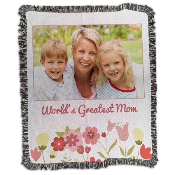 Create a warm and cuddly gift for mom with a personalized blanket or quilt