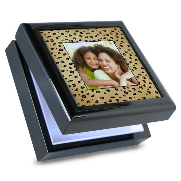 Give mom a personalized keepsake box or mini jewelry box