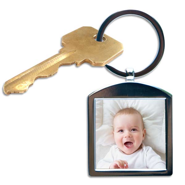 Keep your treasured memories close each day with our silver framed photo keychain.