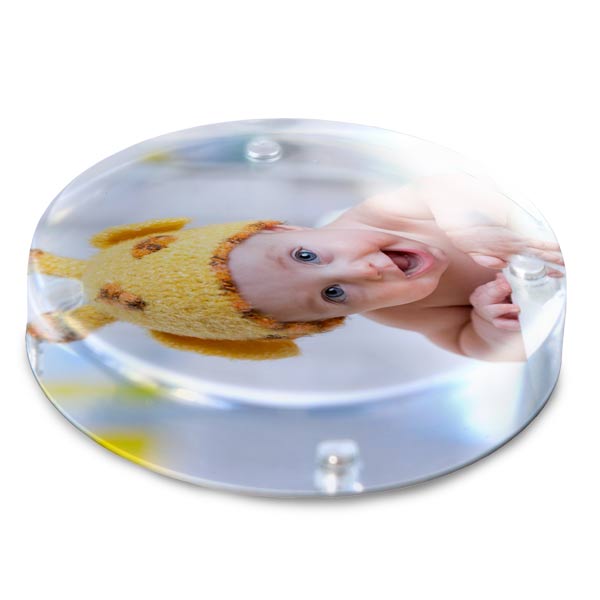 Your photo is printed on aluminum bottom of paperweight which magnets to the bottom and can be seen through the clear acrylic