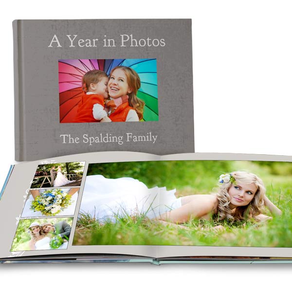 Commemorate an event with personalized lay flat photo books from Print Shop