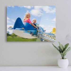 Modern glossy acrylic photo panel floating from wall